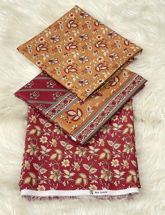 Bin Saeed Unstitched 3-Piece Lawn Suit – Maroon & Mustard Floral Print with Traditional Borders